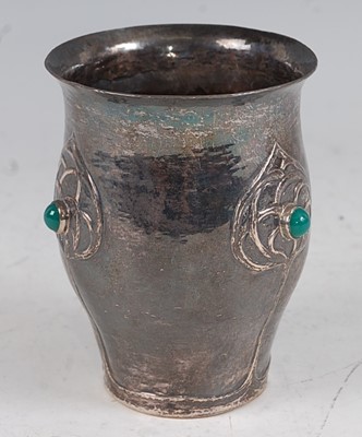 Lot 91 - An Art Nouveau silver hammered beaker, having...