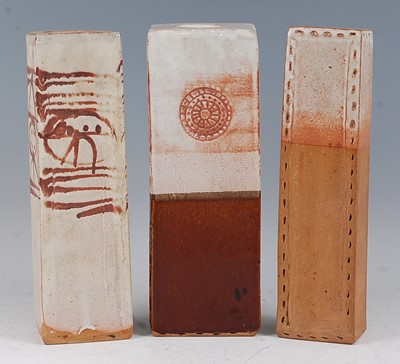 Lot 32 - Three similar studio pottery slab-sided...