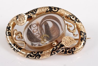 Lot 1203 - A late Victorian yellow metal mourning brooch,...