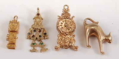 Lot 2640 - Four assorted 9ct yellow gold charms,...