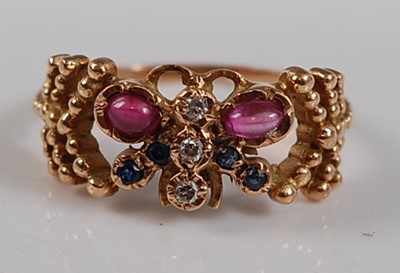 Lot 2642 - A 14ct yellow gold gem set butterfly dress...