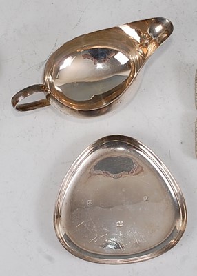 Lot 111 - A 1960s silver pap boat, undecorated and...