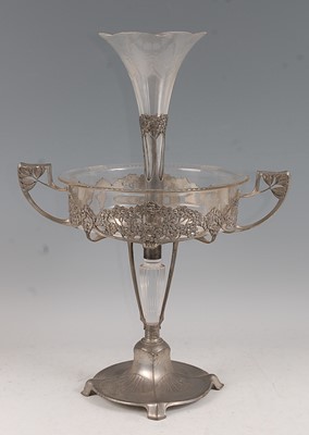 Lot 65 - An Art Nouveau pewter and clear glass...