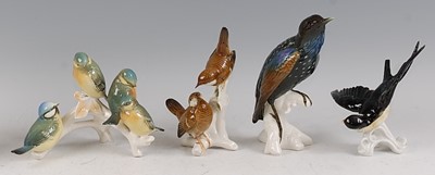 Lot 28 - Karl Ens - a glazed porcelain group of four...