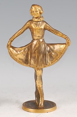 Lot 168 - An Art Deco gilt painted spelter novelty table...