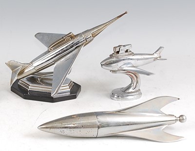 Lot 176 - An Art Deco chrome metal novelty table lighter...