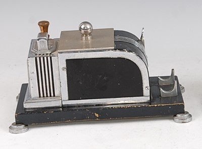 Lot 179 - Ronson - an Art Deco chrome and ebonised...