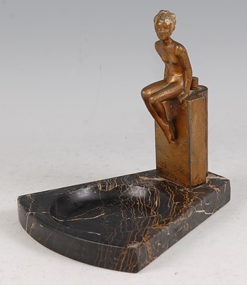 Lot 171 - After Josef Lorenzl - an Art Deco gilt painted...