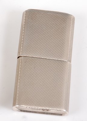 Lot 190 - A late Art Deco silver pocket cigarette...