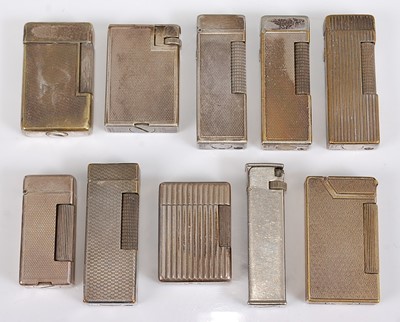 Lot 196 - A collection of nine Dunhill silver plated...