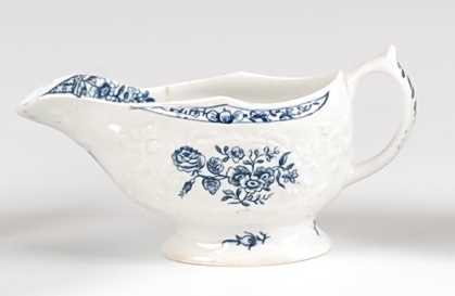 Lot 1041 - A Lowestoft porcelain moulded sauce-boat,...