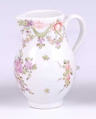 Lot 1047 - A Lowestoft porcelain sparrow-beak cream jug,...