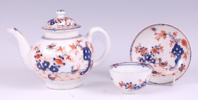 Lot 1036 - A Lowestoft porcelain bullet shaped teapot and...