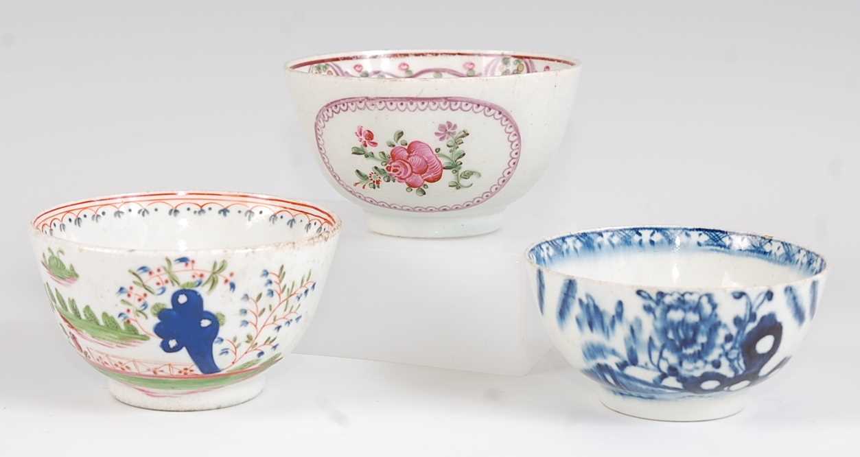 Lot 1045 - A Lowestoft porcelain tea bowl, polychrome...
