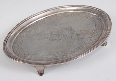 Lot 1178 - A George III silver teapot stand, of oval form,...