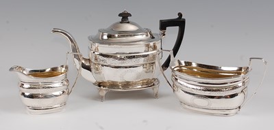 Lot 1120 - A George III silver four-piece tea service,...
