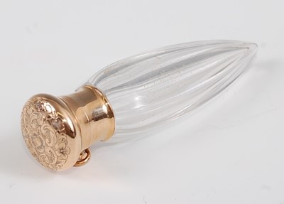Lot 1282 - *A Victorian cut glass and yellow metal topped...