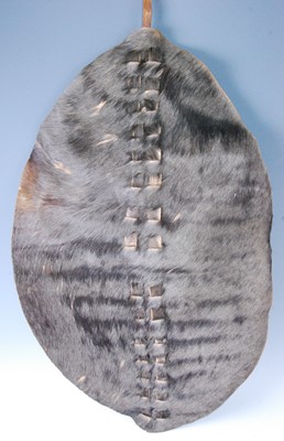 Lot 1338 - A 20th century Masai shield, being of typical...