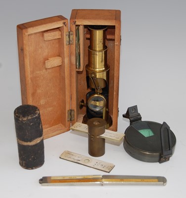 Lot 1302 - An early 20th century lacquered brass students...