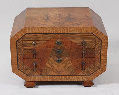 Lot 300 - An Art Deco figured walnut geometric amboyna...