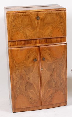 Lot 295 - An Art Deco figured walnut cocktail cabonet,...