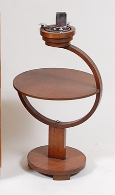 Lot 296 - An Art Deco oak three-tier circular smoking...