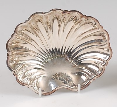 Lot 108 - A 1980s silver scallop shell bonbon dish, of...