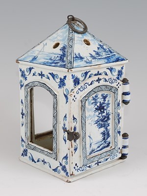 Lot 1085 - A circa 1900 Dutch delft candle lantern, with...