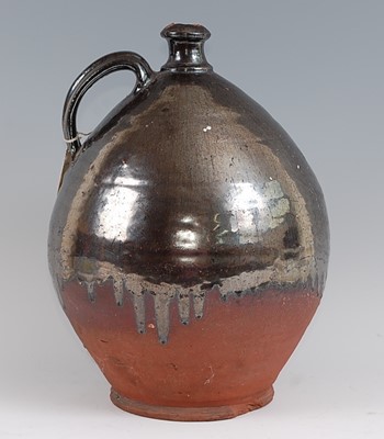 Lot 1033 - An early 19th century earthenware bellamine...