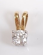 Lot 2606 - An 18ct yellow and white gold diamond single...