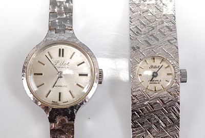 Lot 2610 - Two lady's white metal Pilot incabloc manual...