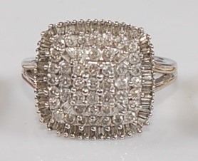 Lot 2586 - A 9ct white gold diamond square cluster ring,...