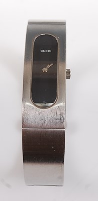 Lot 2518 - A lady's stainless steel Gucci bangle quartz...