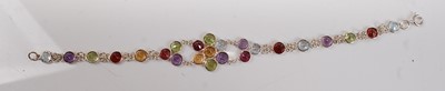 Lot 2523 - A white metal flower design multi-stone...