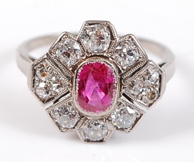 Lot 2535 - A white metal, ruby and diamond Art Deco style...