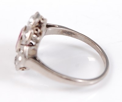 Lot 2535 - A white metal, ruby and diamond Art Deco style...