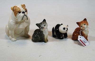 Lot 207 - Four Beswick animal figures being a bulldog,...