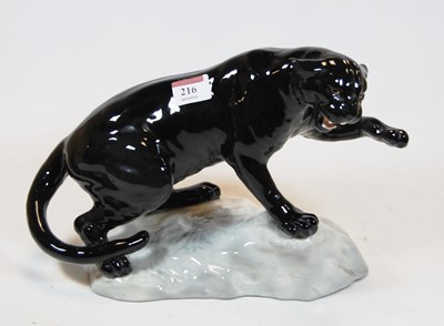 Lot 216 - A Beswick Puma naturalistically modelled upon...
