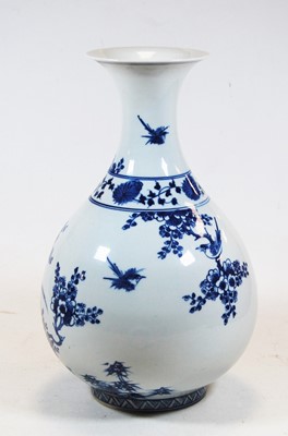 Lot 17 - A Chinese export stoneware blue & white vase...