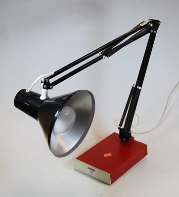 Lot 25 - A 20th century black and red painted...