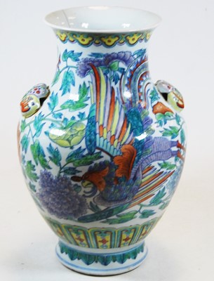 Lot 42 - A Chinese export vase of baluster form with...
