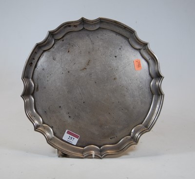 Lot 257 - A Georgian style silver salver, having raised...