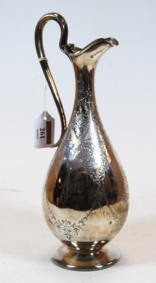 Lot 261 - A late Victorian silver ewer, of slender...