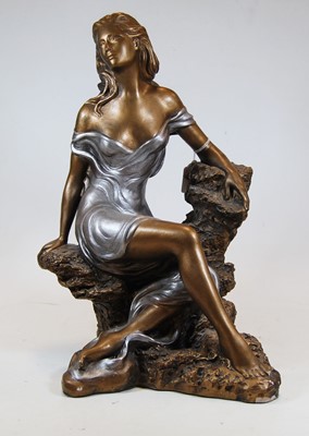 Lot 50 - A contemporary gilt and silver painted plaster...