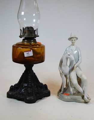 Lot 62 - A 20th century Spanish porcelain figure of a...