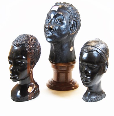 Lot 109 - An African carved hardwood head of a man,...