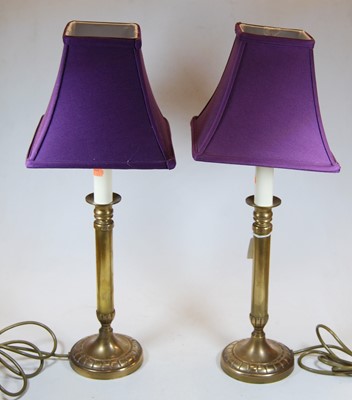 Lot 126 - A pair of 20th century brushed brass table...