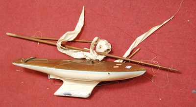 Lot 166 - An early 20th century oak pond yacht, length 77cm