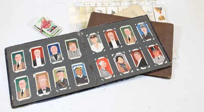 Lot 459 - An early 20th century postcard album and...