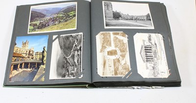 Lot 490 - A postcard album, contents mainly being...